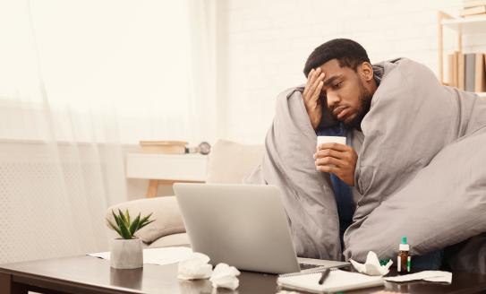 man trying to work when ill
