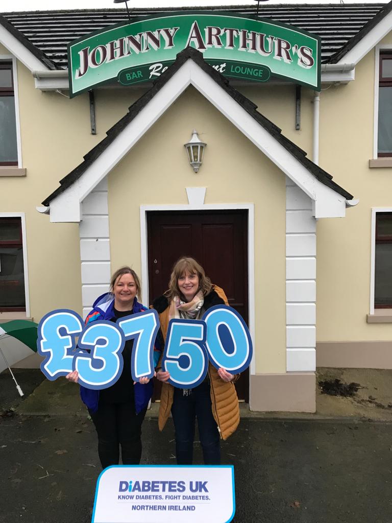 Annie and Naomi outside Johnny Arthur's pub, where they raised £3,750