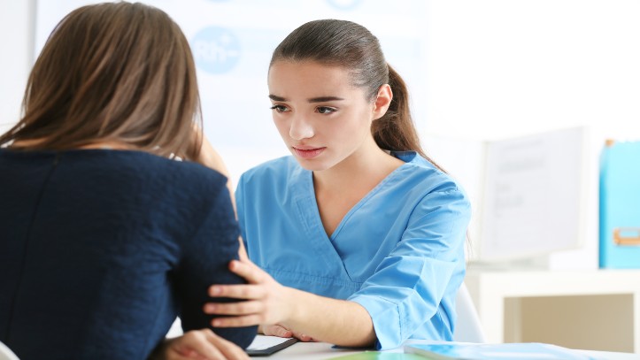 doctor with sad woman