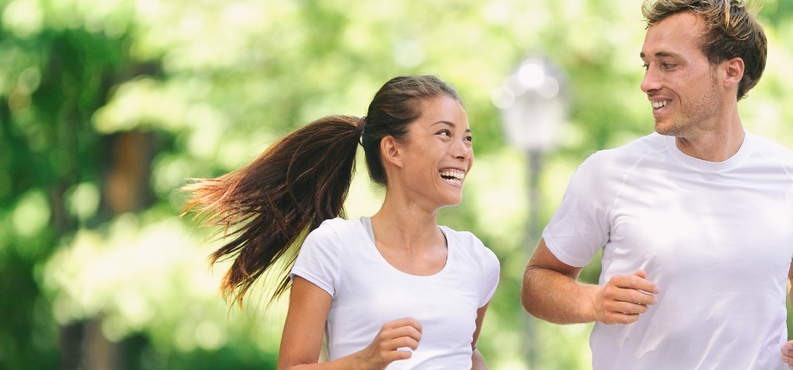 running couple in park