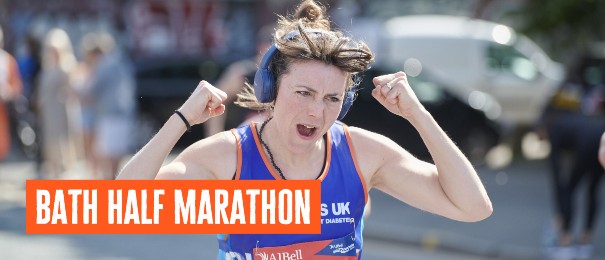 Female runner in Diabetes UK vest cheering