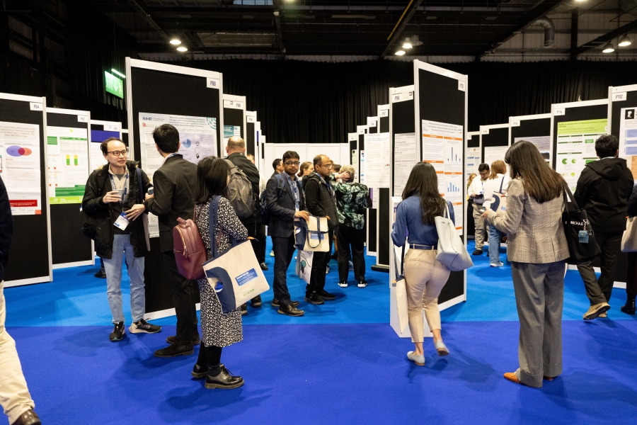 Delegates looking at abstracts