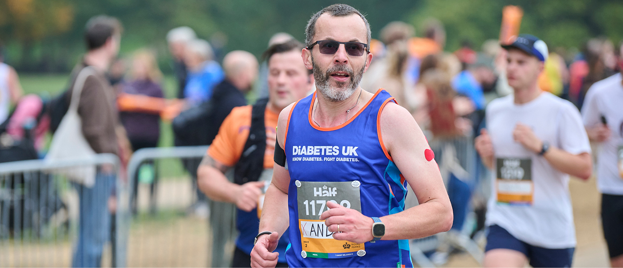 Male runner in sunglasses and Diabetes UK vest.