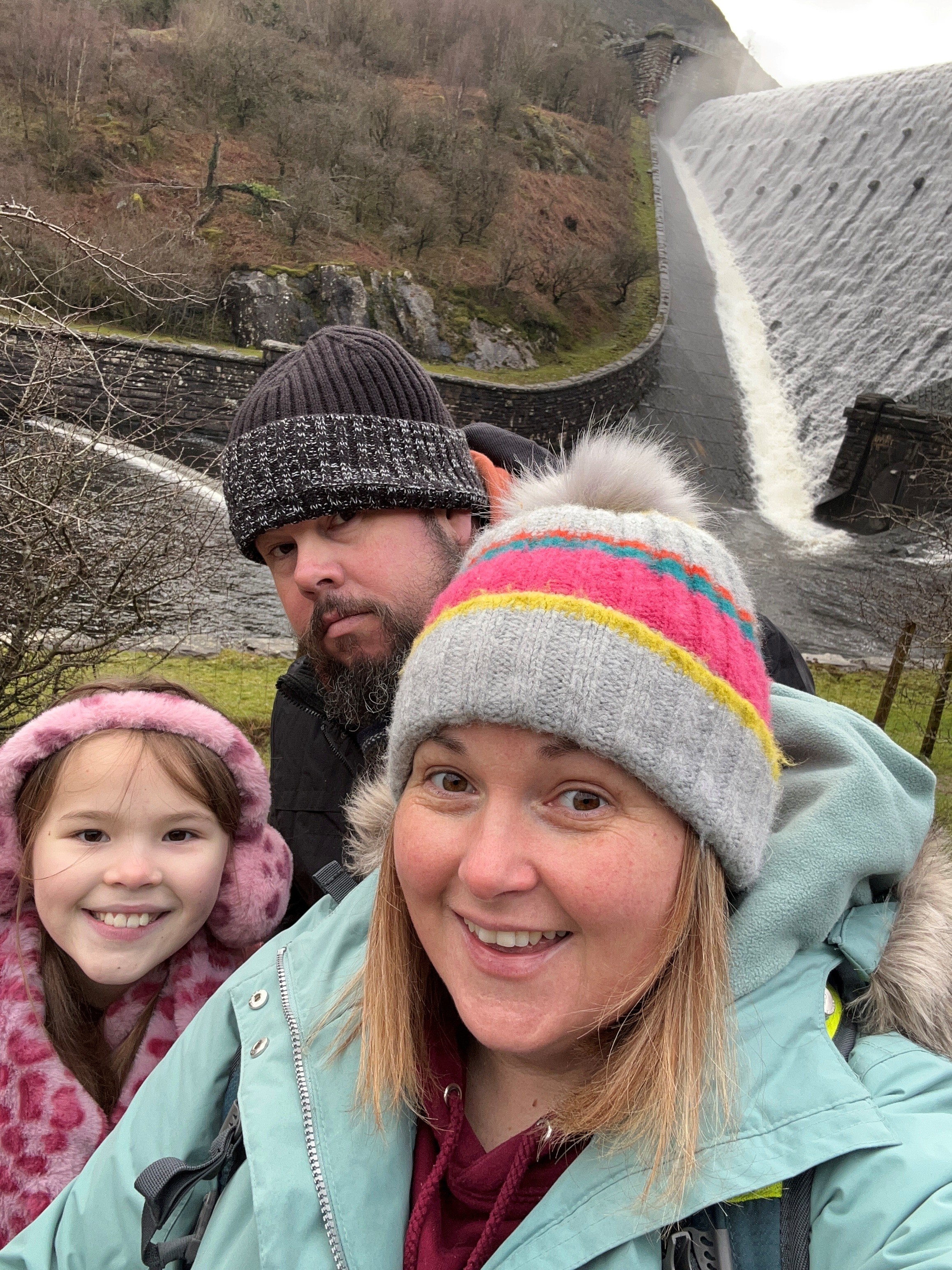 Imogen pictured outdoor with her parents