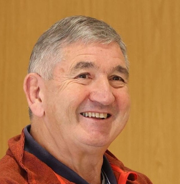 Volunteer Peter Jackson pictured wearing a brown shirt 