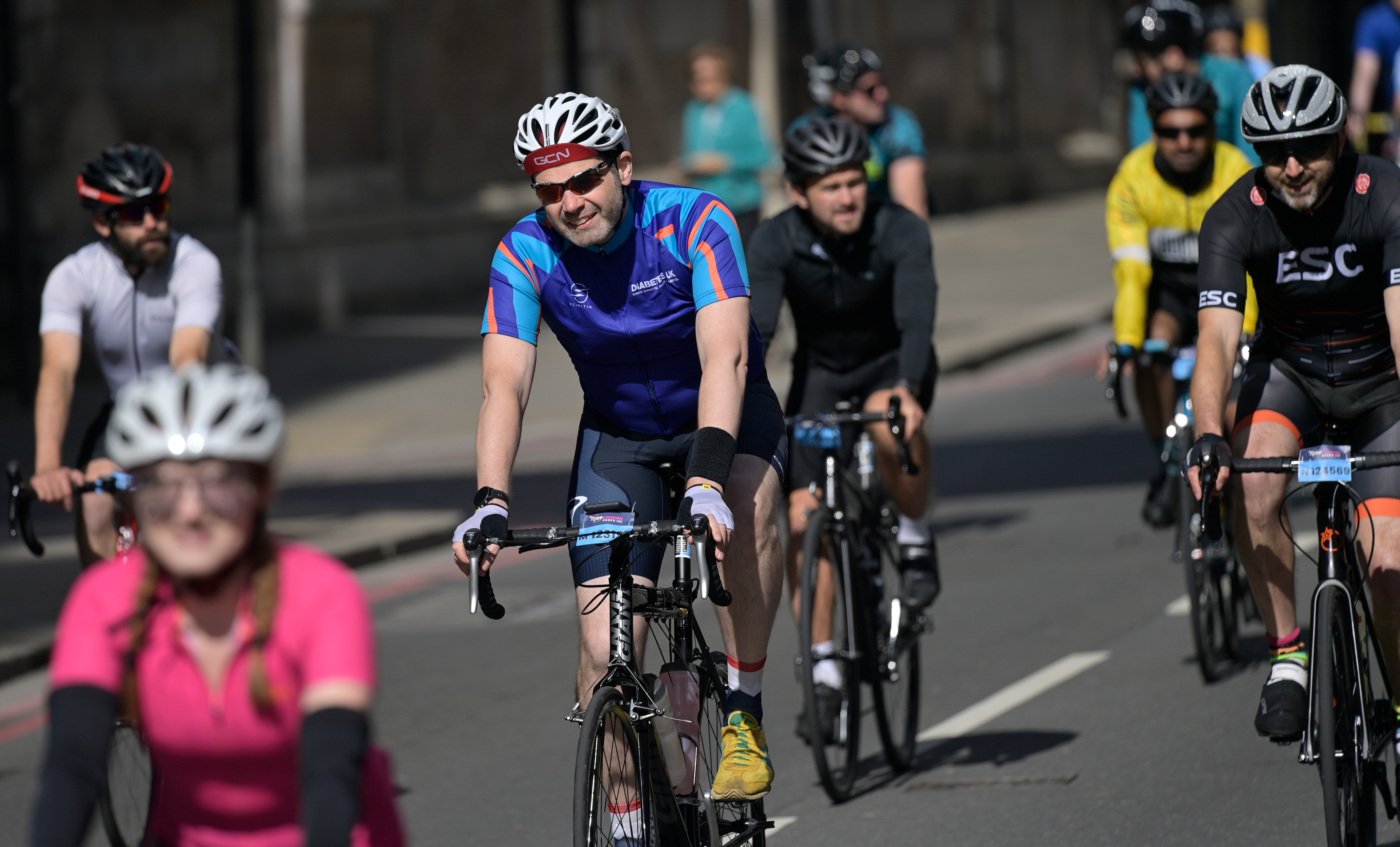 Man cycling in Diabetes UK top