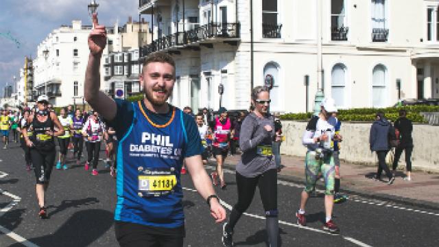 Man running over home made finish line