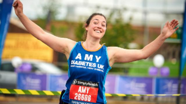 Lady running along race route