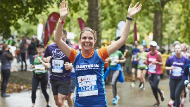 Lady running along race route