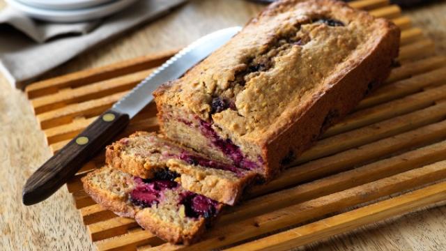 Blackberry and apple cake on a chopping board