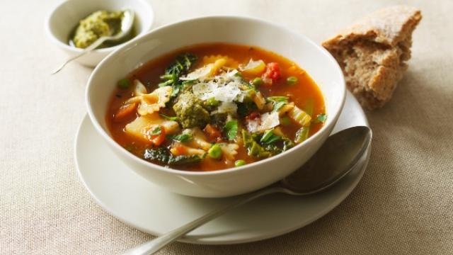 Bowl of minestrone soup with some crusty bread.
