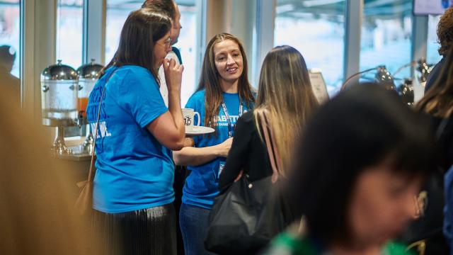 volunteers talking at diabetes uk event 