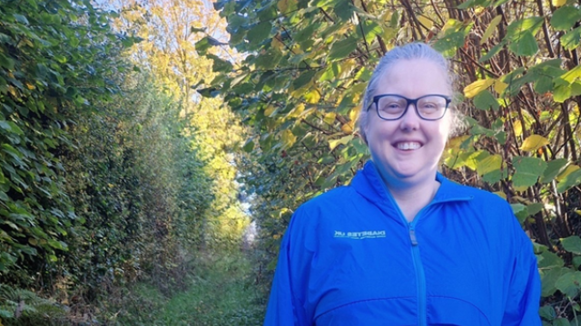 Photo of Roberta Hill, wearing a blue Diabetes UK jacket.
