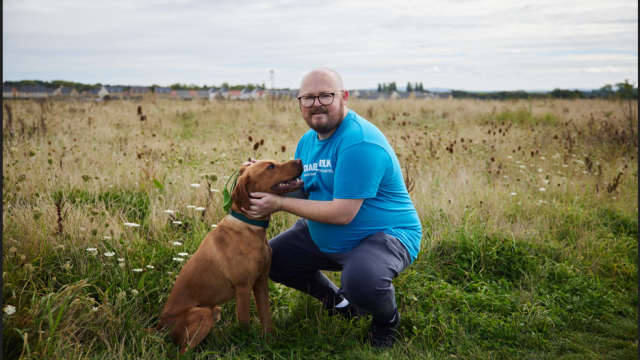 James pictured with his dog
