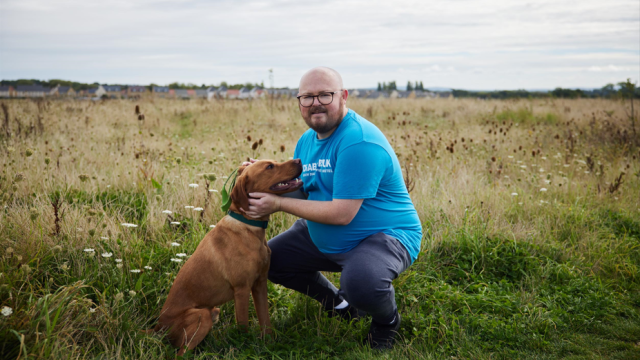 James pictured with his dog