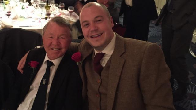 Graham smiling with his father