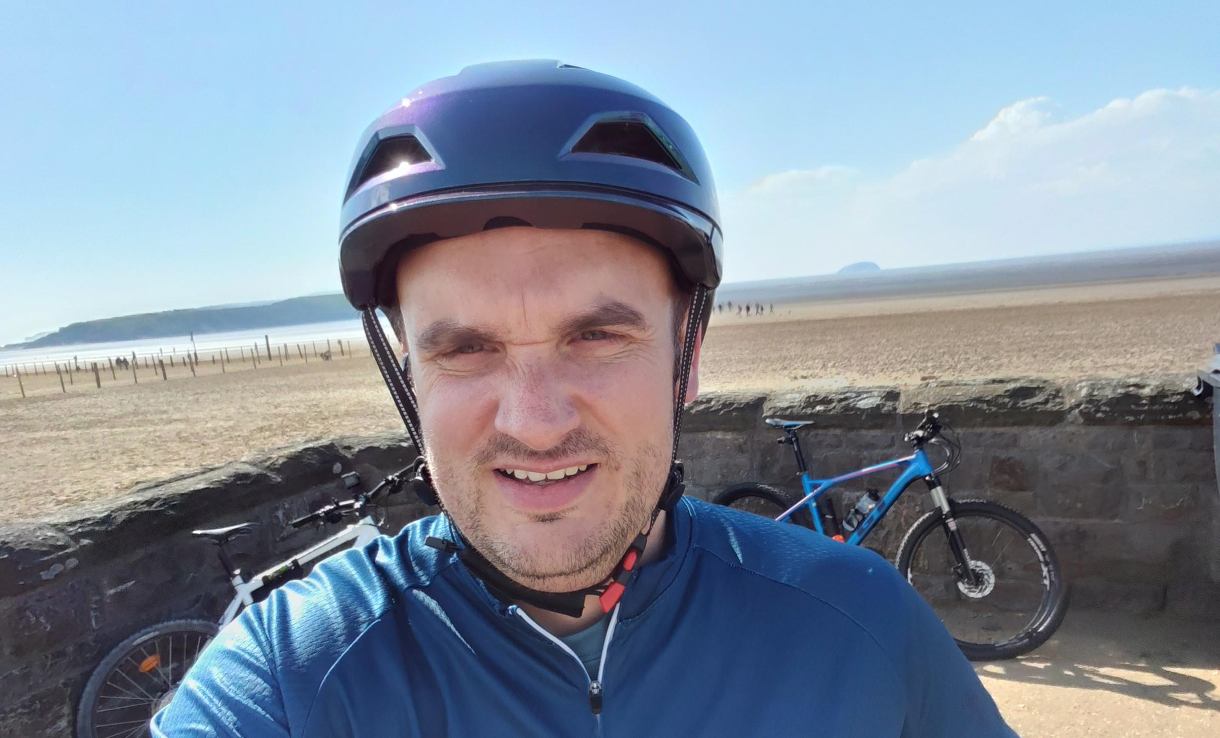 Jamie smiling as he takes on his UK Wide Cycle Ride challenge