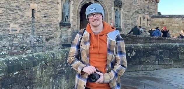 Image of Aidan and his camera