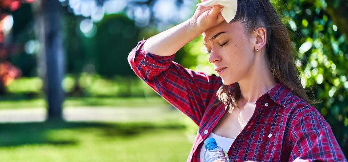 young woman hot in the sun