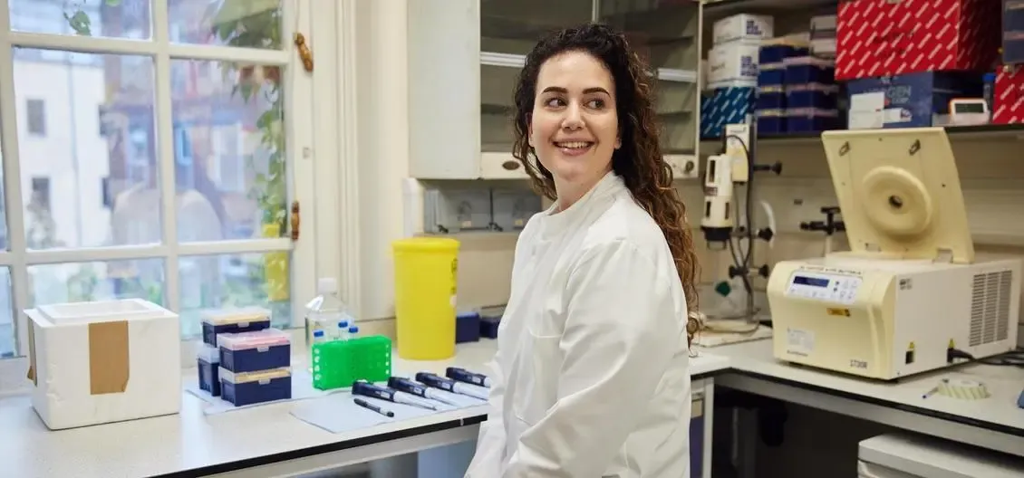 scientist smiling in lab