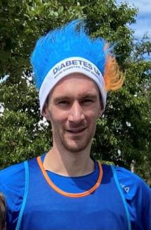 Supporter Andy Granville in Diabetes branded blue hair
