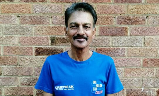 Abdul, our Volunteer Spotlight, smiling into the camera