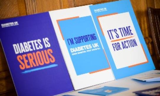 Boards with 'Diabetes is Serious' and 'Time for Action' written on them