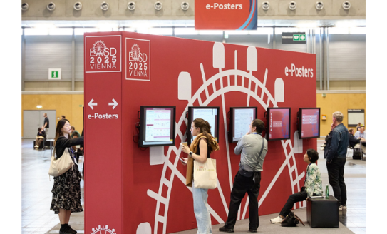 Diabetes researchers looking at posters at EASD 2025