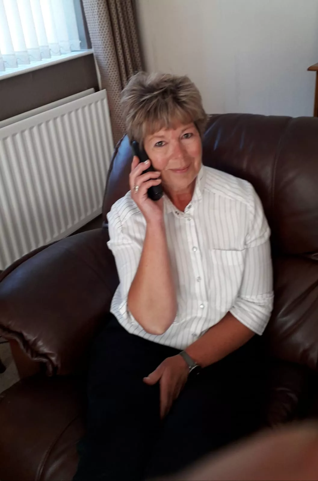 Befriender volunteer Roberta McCullough on a telephone call