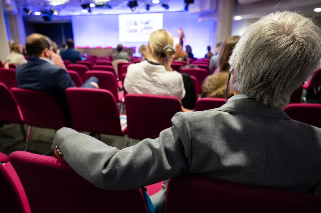 Audience attending a presentation