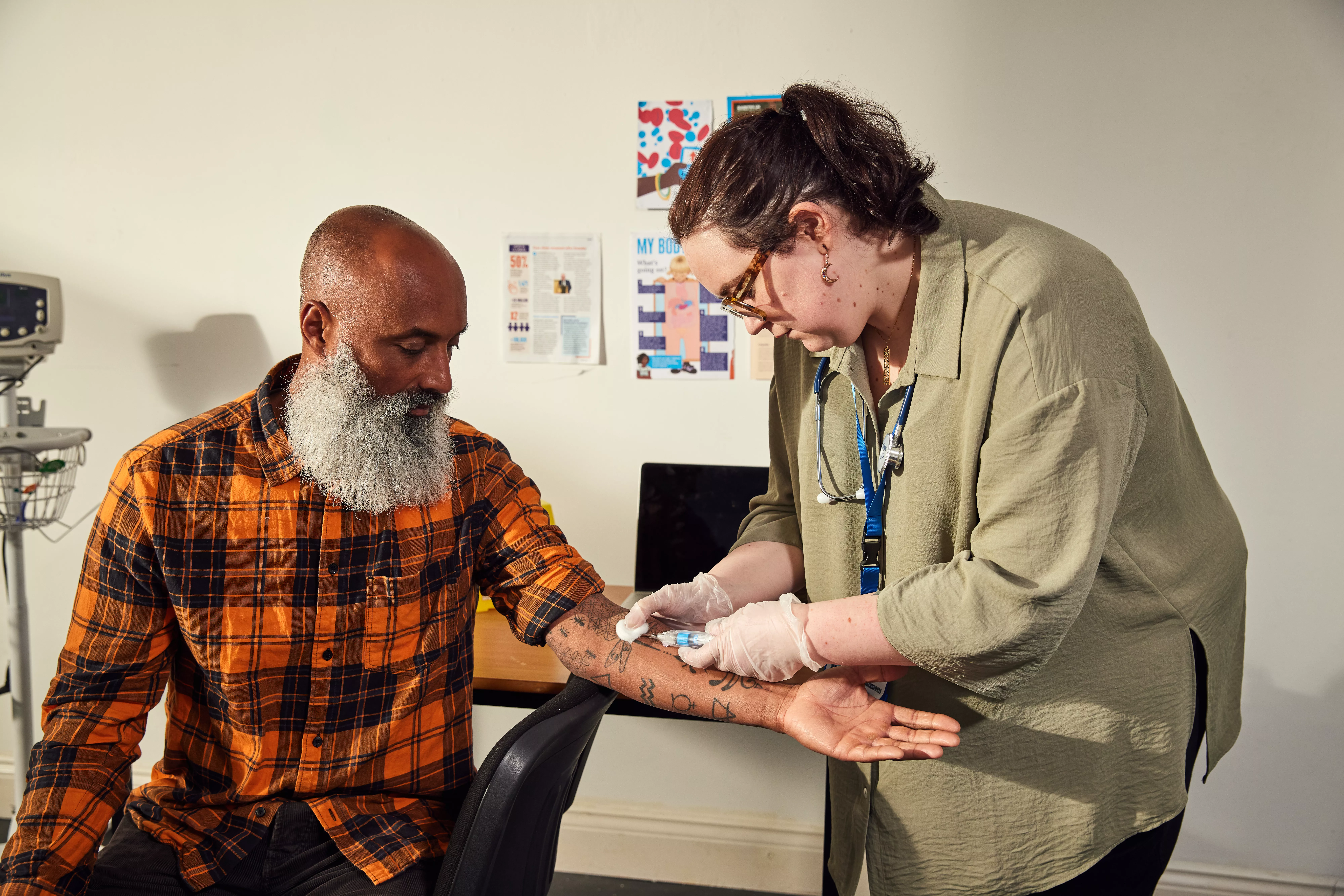 A man is having a blood test in his diabetes appointment