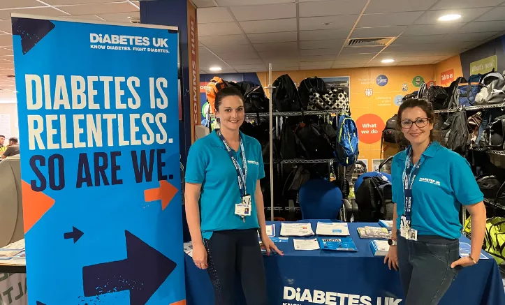 Staff at Diabetes UK stand smiling