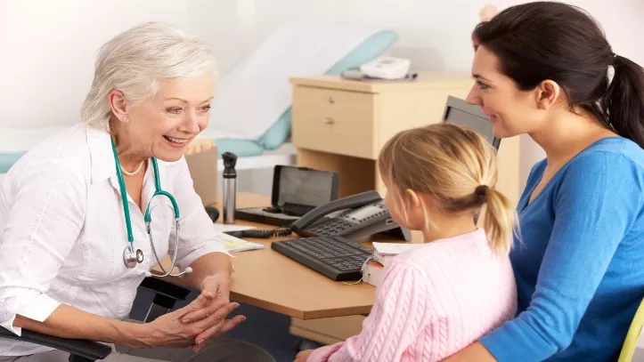 doctor talking to child