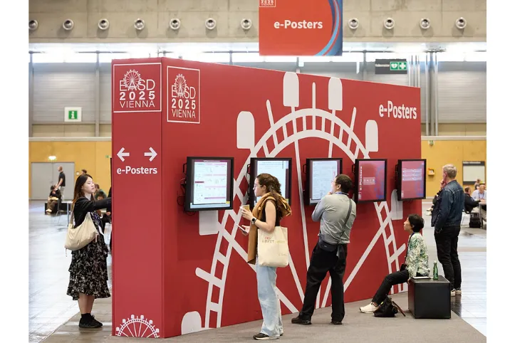 Diabetes researchers looking at posters at EASD 2025