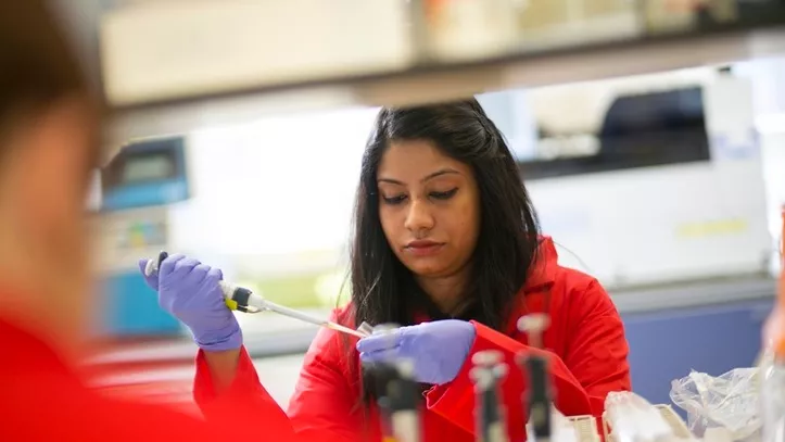 Researcher in lab Thumbnail