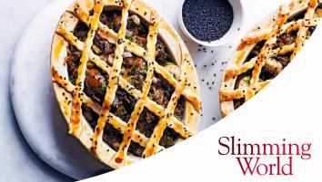 Two lattice mushroom pies on a marble plate