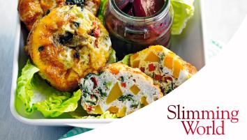 Mini crustless quiches with butternut squash, baby spinach, red pepper, and spring onions on lettuce with a jar of pickled baby beetroot on the side.
