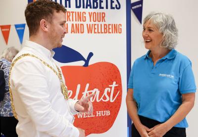 Image of Tina McCrossan and with the Lord Mayor of Belfast, Ryan Murphy