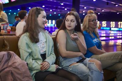 two women talking at a together type 1 event