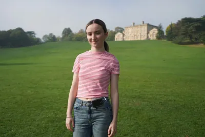 Amelia standing outside on a sunny day