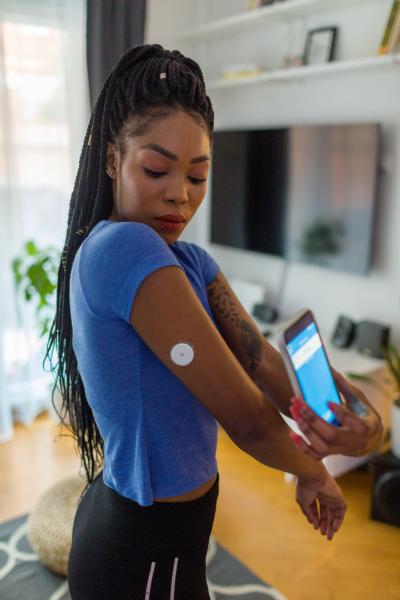 Young person using a CGM